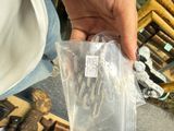 a person that is holding a bag full of items
