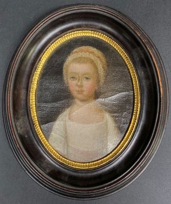 portrait of a young girl in a white dress in a black frame
