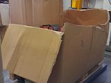 boxes on a pallet in a warehouse are stacked on top of each other