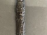 a spoon that is sitting on a table