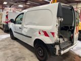a white van that is parked inside of a building