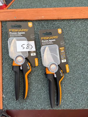 two pliers that are sitting on the floor
