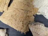 many different types of laces laid out on a table