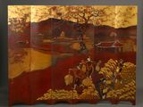 an image of a four panel screen with a painting of a man on horseback
