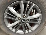 a close up of a tire on a car