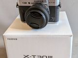 a camera sitting on top of a box on a table
