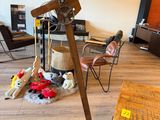 a wooden table with a lamp on it in the middle of a room