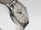 an image of a wrist watch with a white dial on a brown leather strap