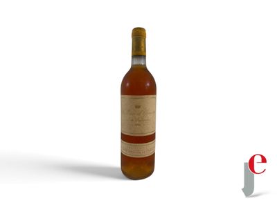 a bottle of wine that is sitting on a table