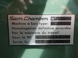 a sign on the back of a machine that says, machine bots type