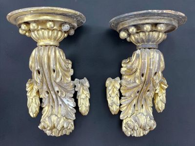 paire d'appliques murales anciennes à la feuille d'or sur fond noir