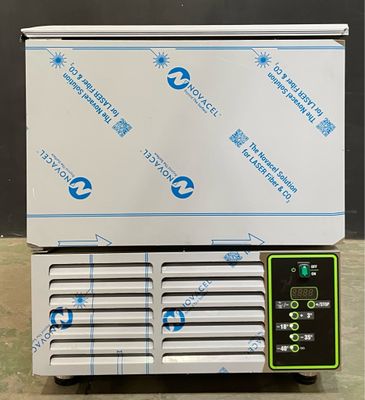 an image of a freezer sitting on top of a counter