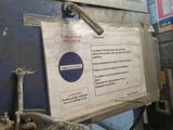 a sign on the side of a machine that says security