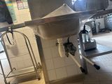 an image of a kitchen with a sink and a counter