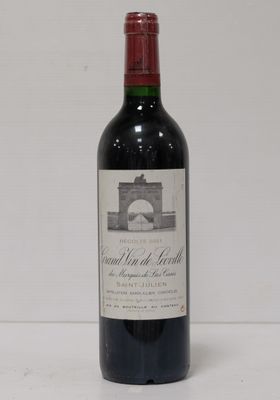 a bottle of wine that is sitting on a table