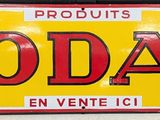 une pancarte sur laquelle est inscrit « Kodak » sur le devant