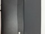 an open laptop computer sitting on top of a white surface