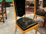 a chair that is sitting in a room with a rug