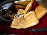 a picture of a car with a leather seat and steering wheel