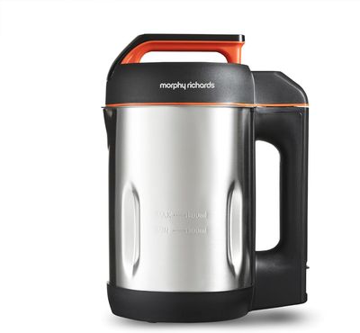 a silver and orange electric tea kettle on a white background