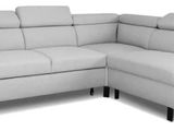 a picture of a white leather sectional sofa with a chaise