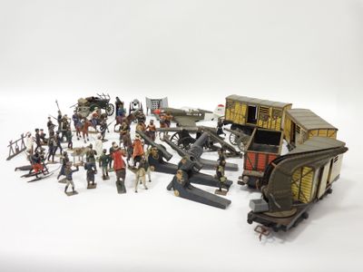 de nombreux petits soldats en position debout devant un bâtiment