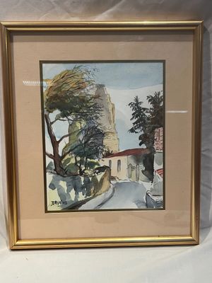 tableau encadré représentant une rue avec des arbres et des bâtiments