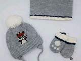 grey and white knitted hat, mittens, and hat with a bow
