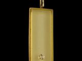 an image of a gold pendant with a diamond in the center