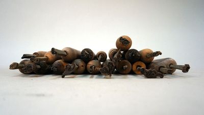 a lot of wooden objects that are on the table