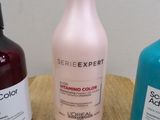 three bottles of sham sitting on a table next to each other