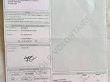 une photo d'un document sur lequel figure la photo d'une personne
