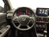the interior of a car with a steering wheel, dashboard, and dash board