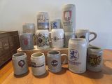many different types of beer mugs sitting on a table