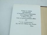 an open book with a black and white picture on it