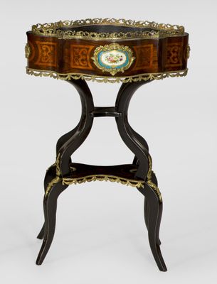 a small table with a decorative decoration on top of it