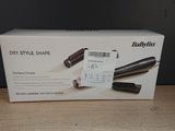 une boîte de Babylis Dry Styler posée sur une table