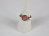sterling silver ring with a red stone and pearls