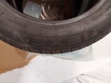 a tire that is sitting on top of a box