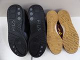 three pairs of shoes are lined up next to each other on a table