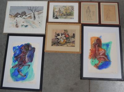 il y a beaucoup d'œuvres d'art encadrées par terre dans cette pièce