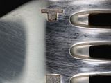 a close up of a fork with a metal handle
