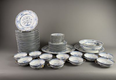 a lot of plates that are stacked together on the table