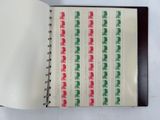 a book with a red and green design on it