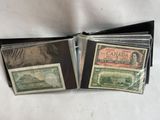two old canadian bank notes are sitting in a wallet