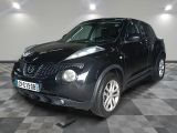 a picture of a black nissan juke suv parked in a garage