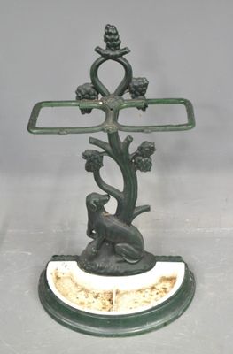 a statue of a monkey sitting on top of a tree