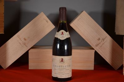 a bottle of wine that is sitting on a table