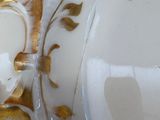 a close up of a plate with a heart on it