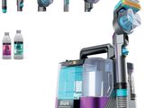 several different types of vacuum cleaners and a bottle of cleaner
